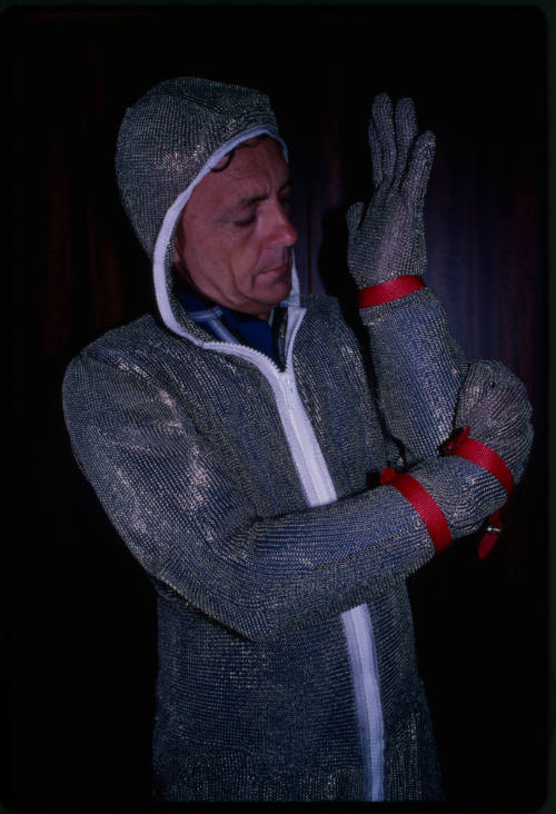 Behind the scenes image from the television feature, Operation Shark Bite, that documented Ron and Valerie Taylor testing the efficacy of the chainmail suit (mesh suit) against shark bites.  