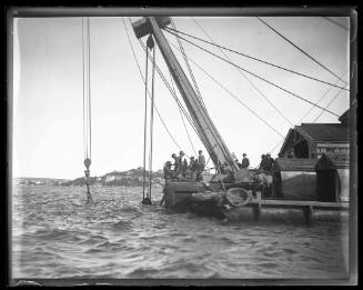 Sheerlegs crane probably salvaging the wreck of Sydney ferry GREYCLIFFE