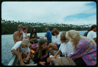 People including the cast of Blue Lagoon 2 on a boat