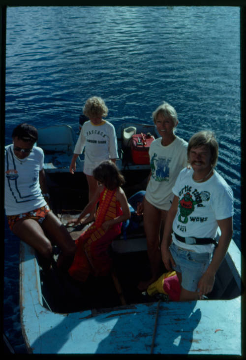 Valerie and Ron Taylor with the cast of "The Blue Lagoon" on a boat