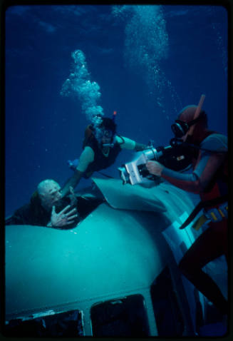 Ron Taylor filming underwater