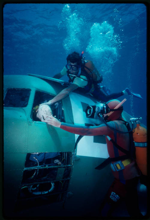 Filming around submerged prop plane for "Sky Pirates"