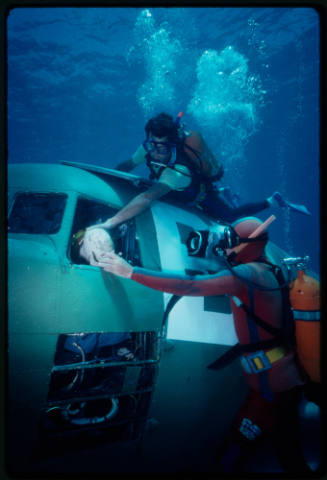 Filming around submerged prop plane for "Sky Pirates"