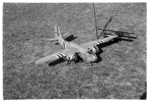 Model plane on grassy field