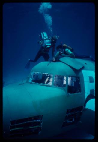 Filming around submerged prop plane for "Sky Pirates"