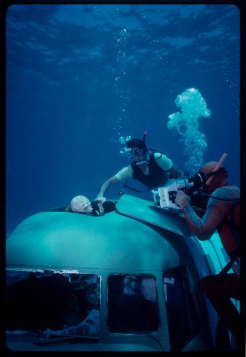 Filming on submerged prop plane for "Sky Pirates"