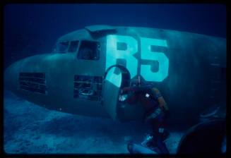 Filming around submerged prop plane for "Sky Pirates"