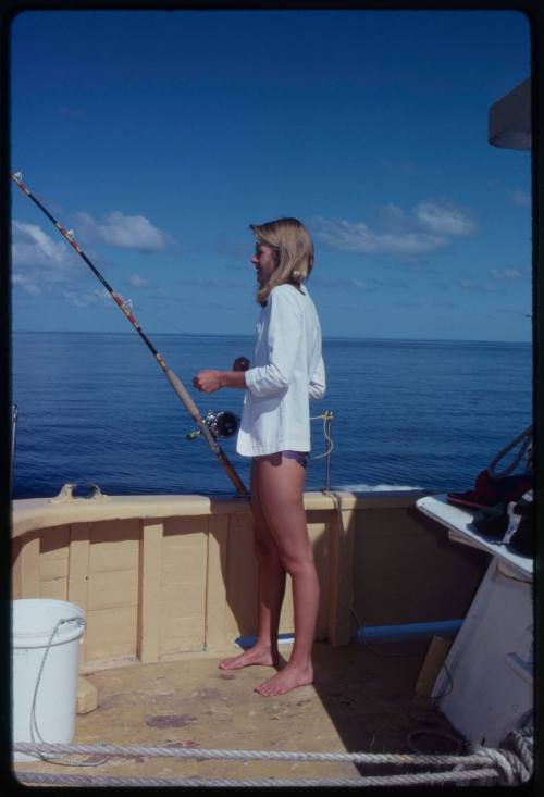 Woman fishing during filming of "The Blue Lagoon"