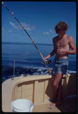 Chris Atkins fishing during filming of "The Blue Lagoon"