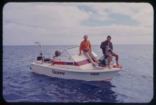 Rodney Fox and Ron Taylor on the bow of a boat waiting for great white sharks during the filming of "Jaws"