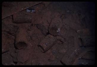 Old bottles in the cargo hold of a shipwreck