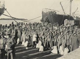 Men from the 10th Field Company Engineers wait to board HMAT RUNIC