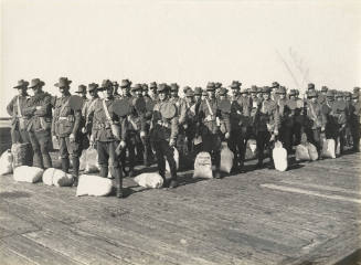 Soldiers waiting to board the troopship WARILDA