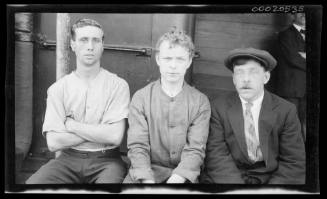 Three unidentified merchant marine crew members of SS IONIC II