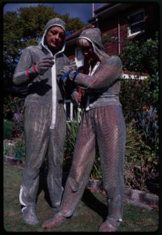 Behind the scenes image from the television feature, Operation Shark Bite, that documented Ron and Valerie Taylor testing the efficacy of the chainmail suit (mesh suit) against shark bites.  