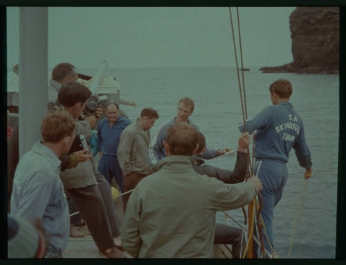 Shot of group of people standing on a wharf