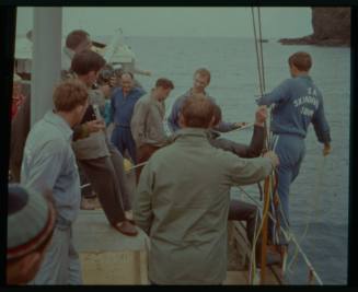 Shot of group of people on board a vessel at sea