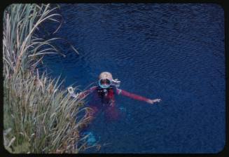 Valerie Taylor in the water with head above surface