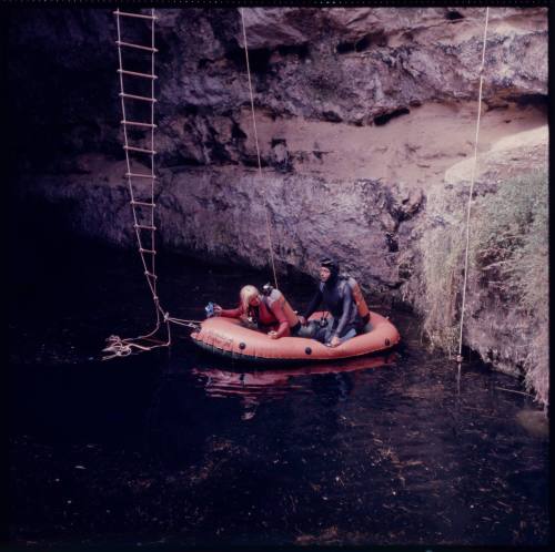 Valerie and Ron Taylor on an inflatable boat