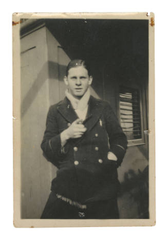 Dudley Charles Northam holding a pipe