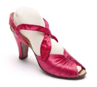Left pink satin high heeled shoe 