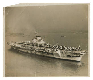 Royal Navy aircraft carrier with Supermarine Seafire and Fairey Firefly aircraft embarked in Sydney Harbour