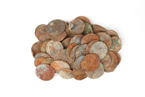 Bag of coins and tokens from the wreck of the DUNBAR