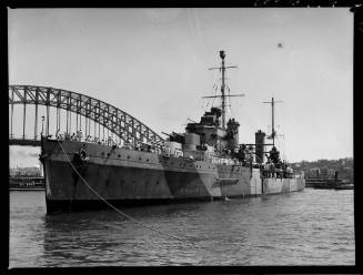 HMAS SYDNEY II alongside Sydney Harbour Bridge