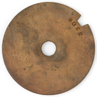 Clock barrel lid recovered from the wreck of the DUNBAR