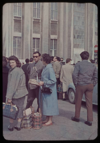 Crowd of people with luggage