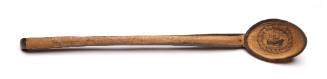 Carved wooden ladle given to Charles Hunter Graham as booby prize on SS SALAMIS