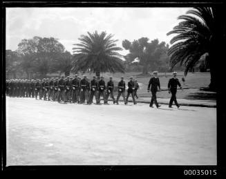 Military procession of American marines and sailors from USS ASTORIA