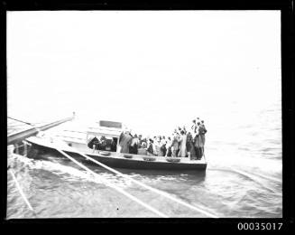 View of motor launch ANGLER with passengers.