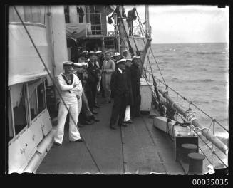 Naval officers and sailors of watching the sinking of HMAS TORRENS I
