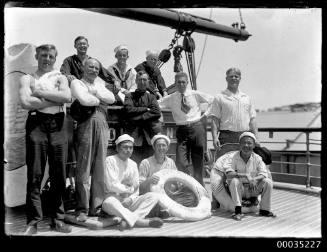 Crew posing on board the four-masted steel barque JOHN ENA