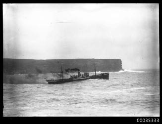 Cargo ship exiting Harbour at North Head