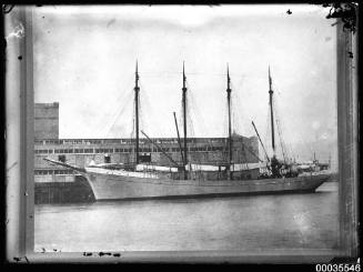 Four masted schooner TACOMA  alongside a wharf
