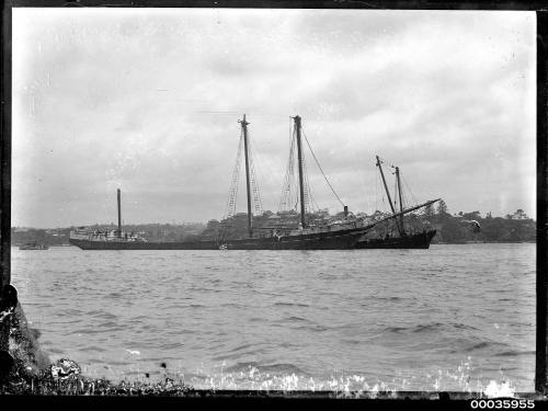 Image of INCA de-masted in harbour.