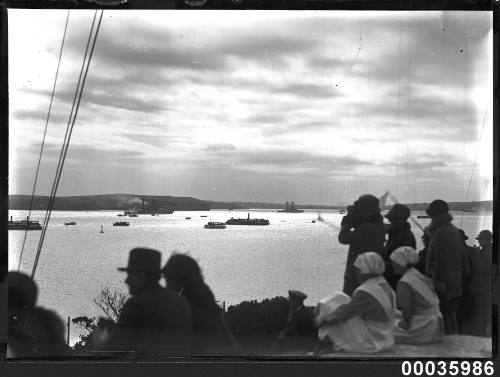 Two US Navy warships possibly leaving Sydney Harbour