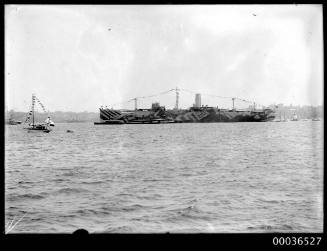 Cargo ship in dazzle camouflage