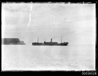 Cargo liner entering North Head Sydney Harbour