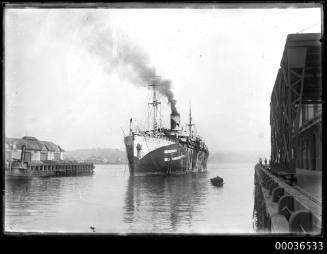 Cargo ship in dazzle camouflage