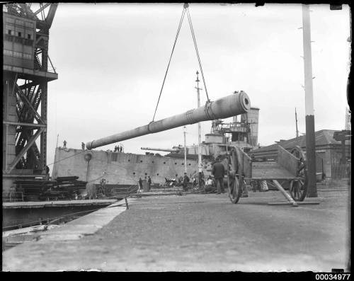 Guns being removed from the former HMAS AUSTRALIA I