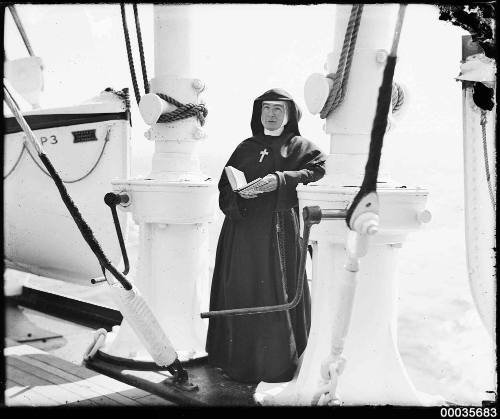 Nun standing on the deck of SS ORUNGAL