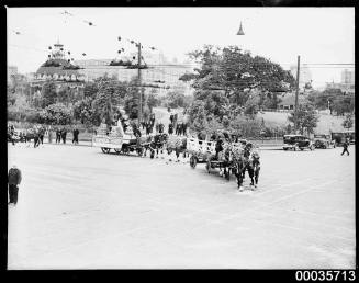 Horse drawn parade at corner of College and Park Streets in Sydney