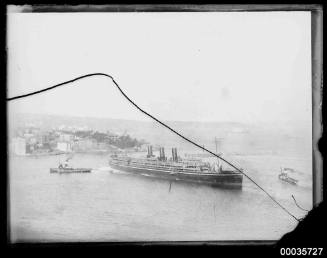 Unidentified passenger vessel being towed near Kirribilli Point, Sydney.