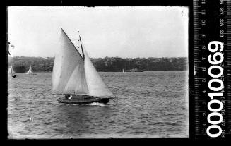 Starboard view of a yacht sailing on Sydney harbour