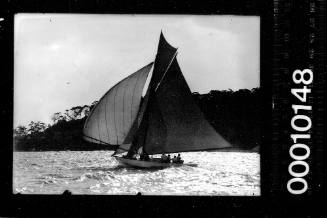 Gaff rigged yacht with the number '18' displayed on the mainsail, Sydney Harbour