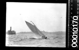 Sailing vessel on Sydney Harbour with a steam ferry in the background