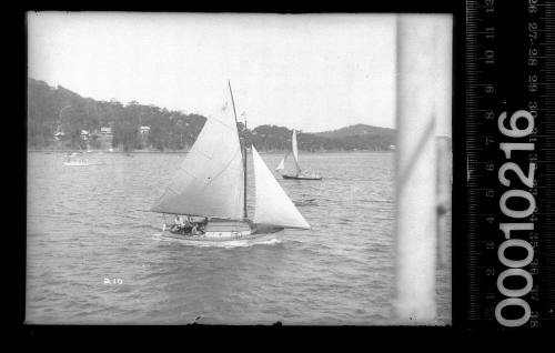 Partly decked amateur class yacht with 'A 13' displayed on the mainsail, Pittwater, New South Wales